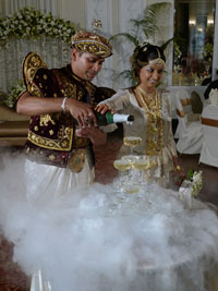 pouring champagne over dry ice