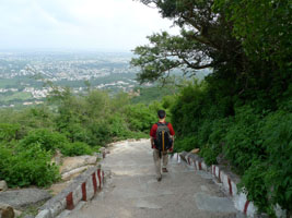 Howard walking down from Chamundi; city of Mysore below