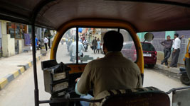 riding in a rickshaw