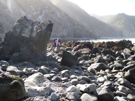 climbing over boulders