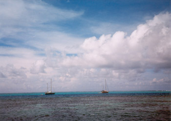 boats on blue water, french polynesia