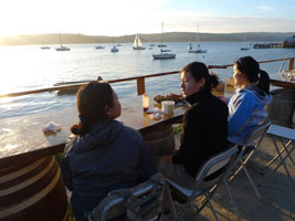 watching the sun set, eating oysters