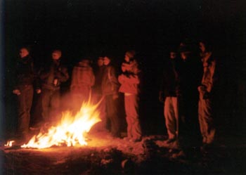 warming by a fire in San Juan