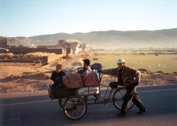 man and woman headed to market, Puno
