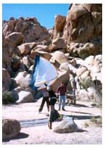 Berto and Karen shaking out their tent