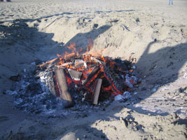 pit firing the pottery