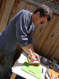 Mike cutting steaks