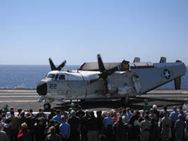 C-2 aircraft with folded wings after landing