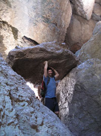 Josh lifts a boulder