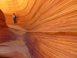 joy walking through a canyon