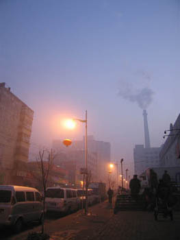 Typical Urumqi sights, with coal smokestack