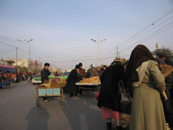 bread seller and broom seller, Kashgar