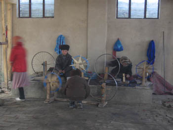 spinning silk with spindles made from bicycle parts