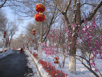 walkway with ice sculptures and paper leaves