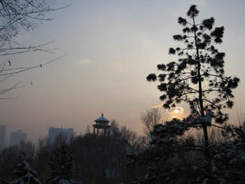 low sun over frigid Urumqi, January